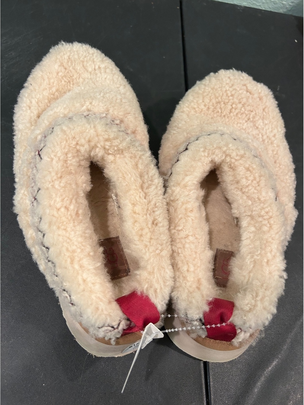 Size 9 Ugg tan slippers